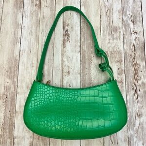 Green handbag with accent